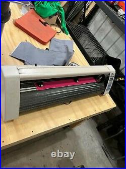 Vinyl plotter cutter with cut software and stand. Used, but in excellent cond
