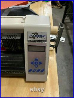 Vinyl plotter cutter with cut software and stand. Used, but in excellent cond